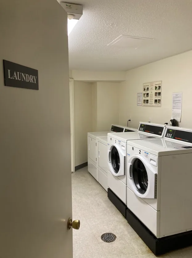Washers in a shared laundry room